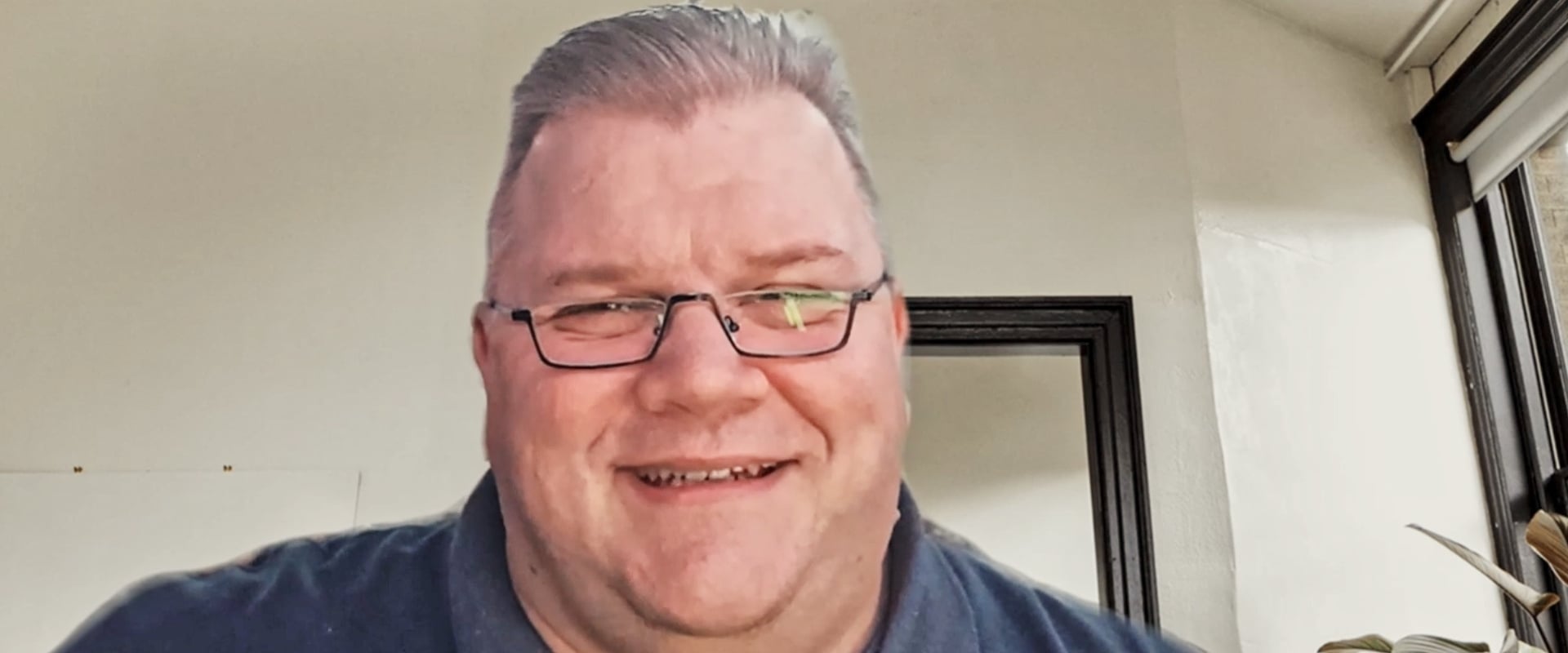 Michael Scheuch lächelt zufrieden in die Kamera