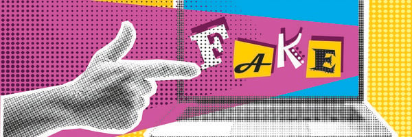 Eine Hand zeigt auf den Schriftzug 